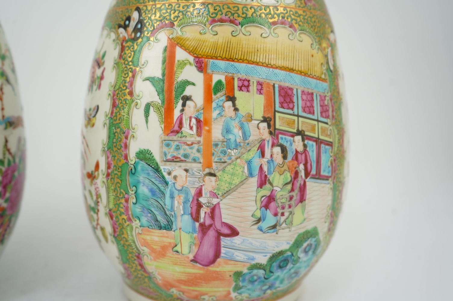 A pair of Chinese famille rose baluster vases, 19th century